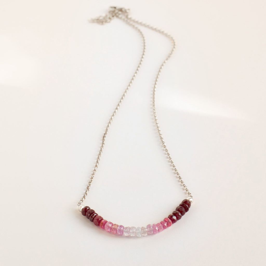 Ombré Ruby Necklace in sterling silver with red, pink and clear beads in a gradient at centre— Abiza.
