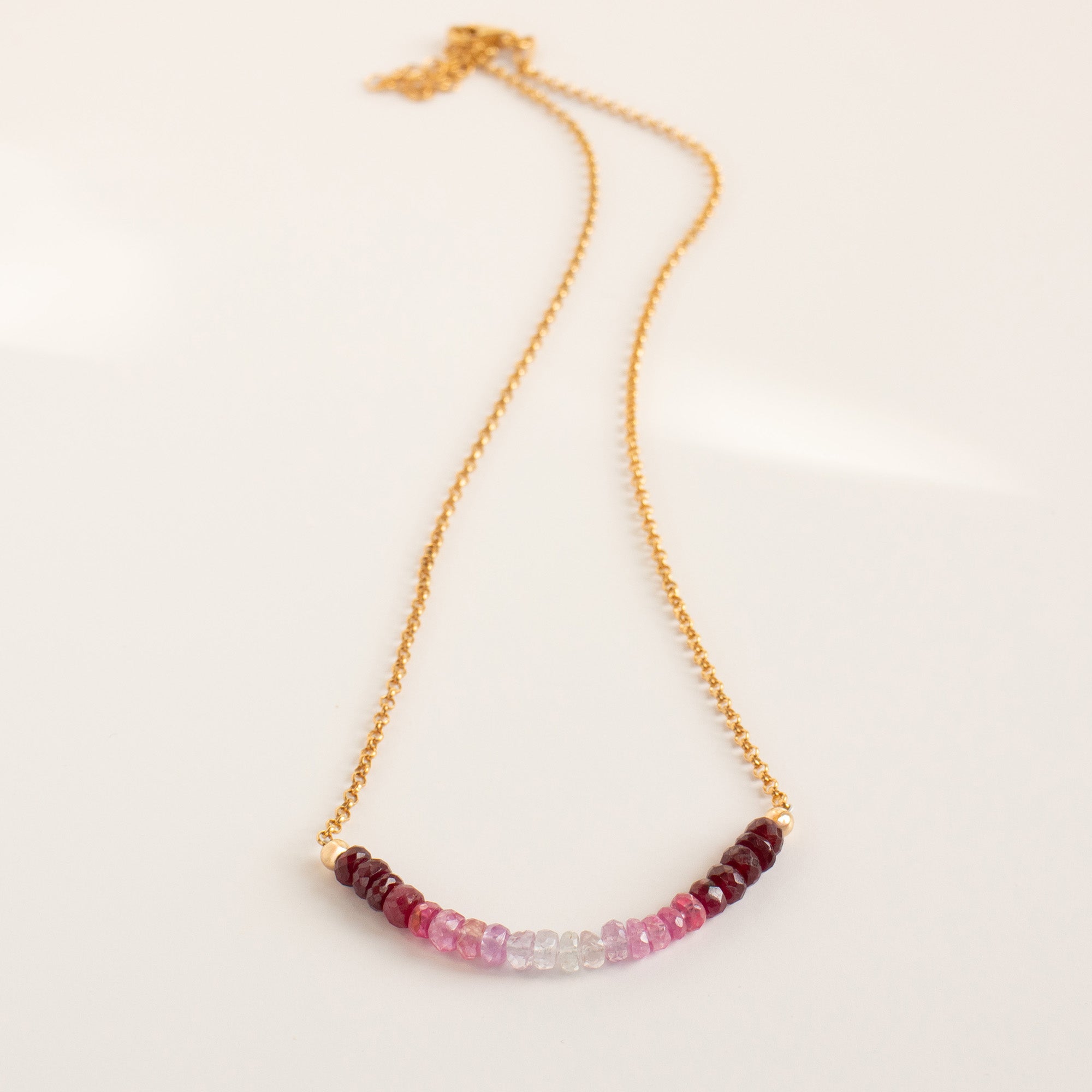 Ombré Ruby Necklace in 18K Gold Vermeil with gradient pink and red ruby beads on a gold chain — Abiza.