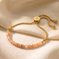 Gold sunstone bracelet with 4mm genuine warm-orange sunstone beads on adjustable slider chain